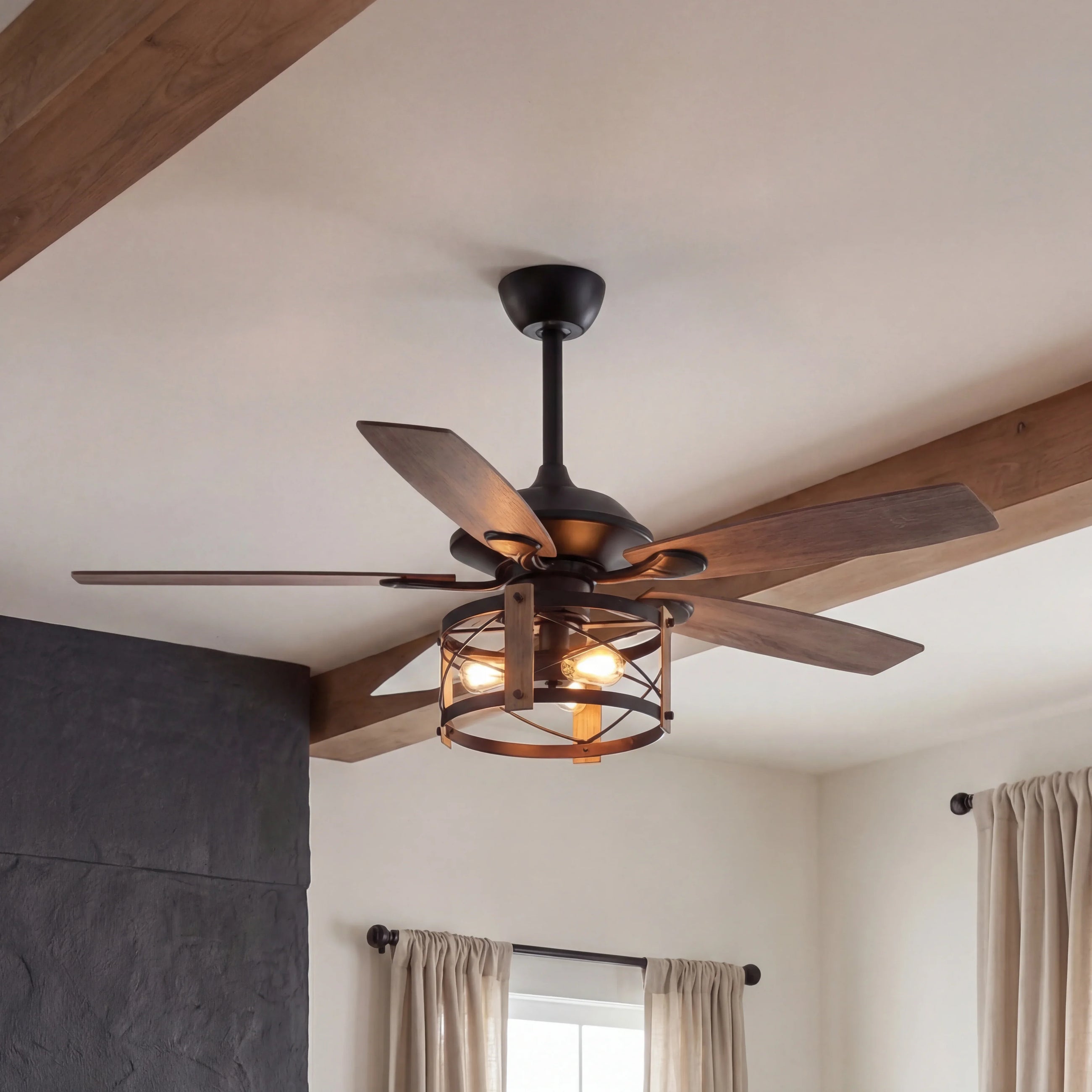 Industrial ceiling fan with wood blades and cage light fixture in a modern living room