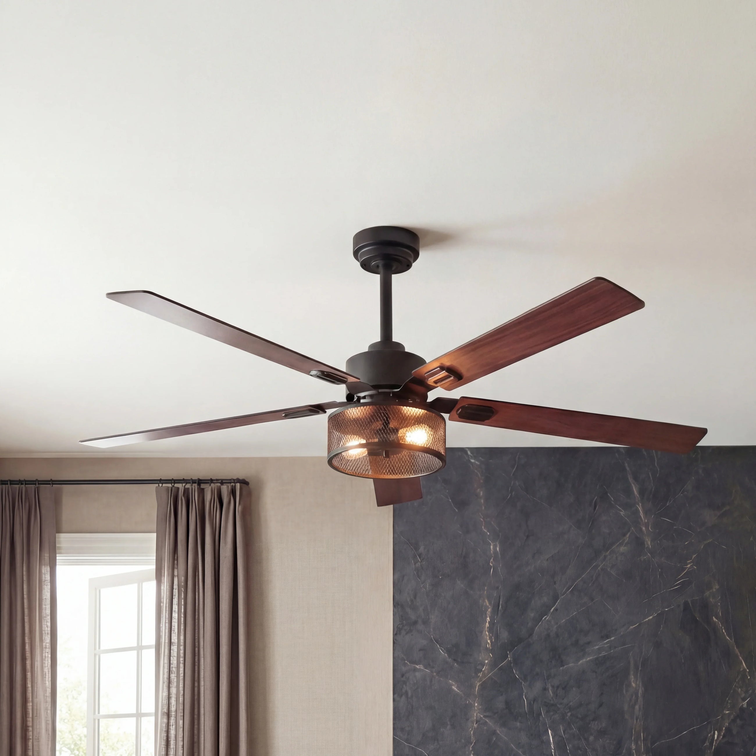 Modern wood ceiling fan with black metal mesh light fixture in a contemporary living room