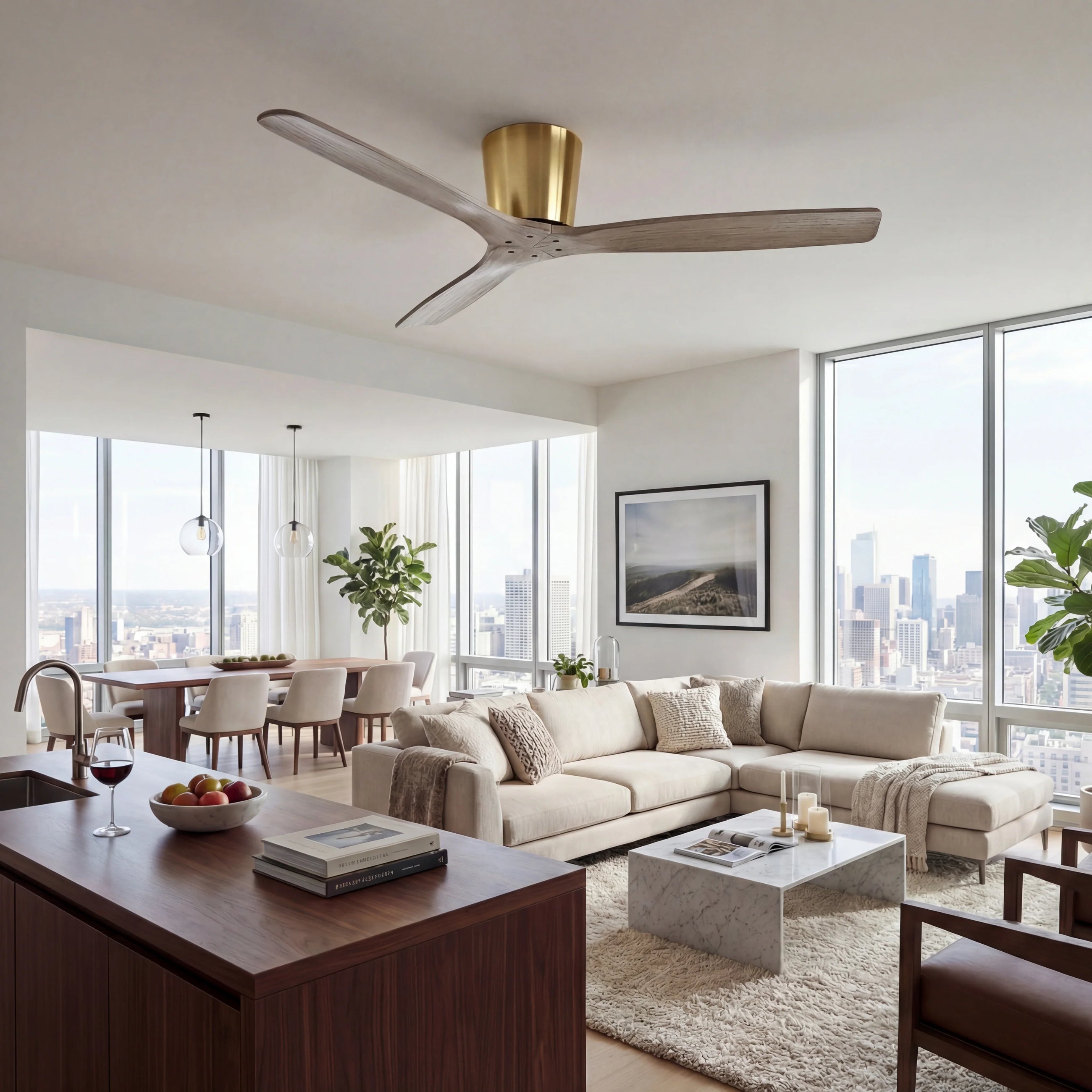 Modern wood ceiling fan with gold mount in bright, stylish living room with city view
