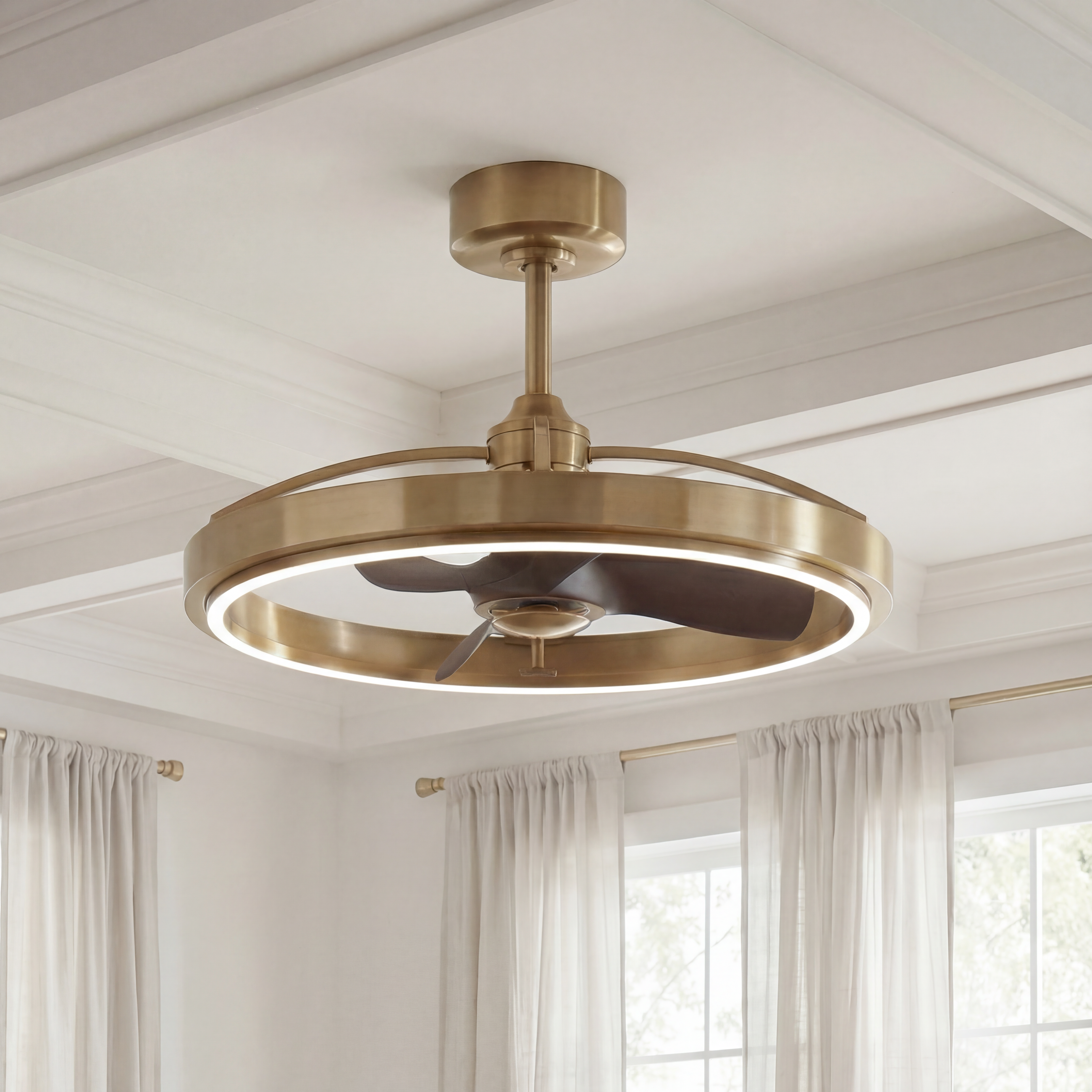 Modern gold fandelier ceiling fan with integrated LED light in a bright living room