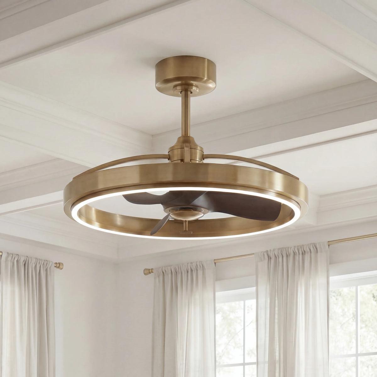 Modern gold fandelier ceiling fan with integrated LED light in a bright living room