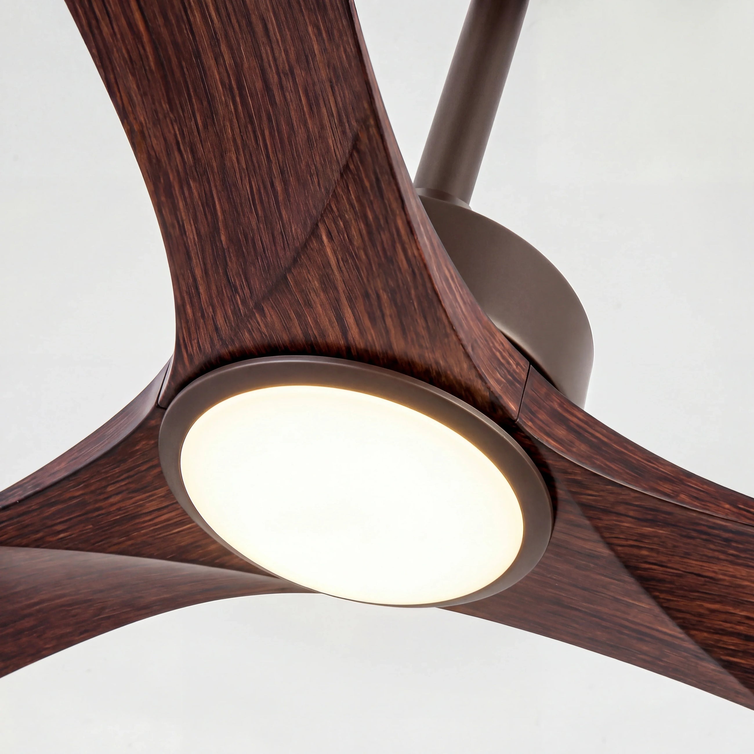 Modern wood ceiling fan with integrated LED light and three dark wood blades