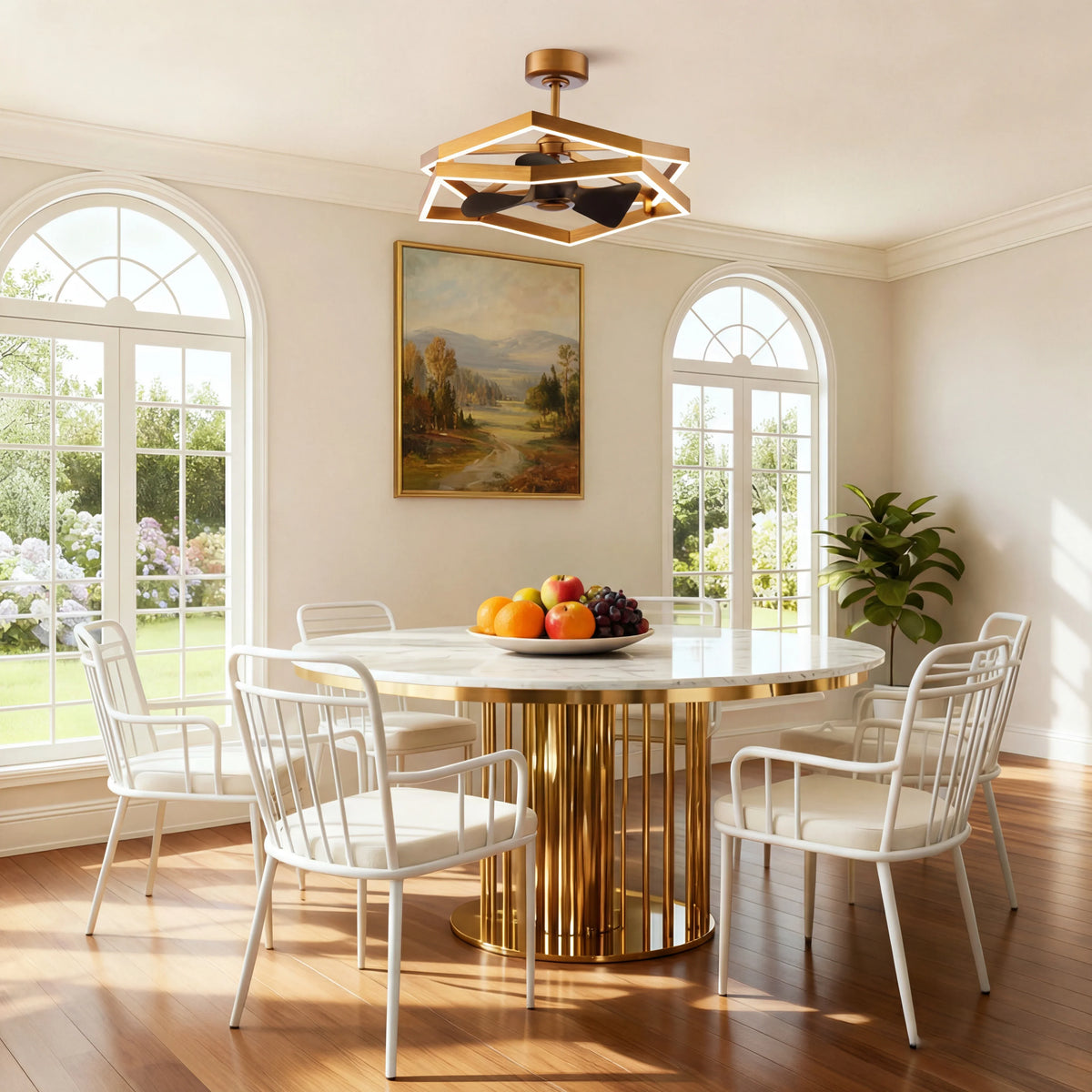 Modern gold fandelier ceiling fan with LED lighting in bright dining room with marble table