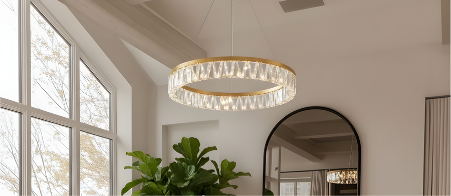 Modern crystal ring chandelier with gold trim in a bright, stylish living room