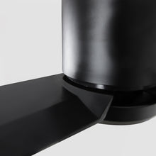 Close-up of modern matte black ceiling fan blade and motor housing