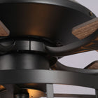 Close-up of modern industrial ceiling fan with black metal housing and wood blades