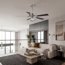 Modern chrome ceiling fan with light in a contemporary living room with neutral decor.