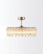 Modern semi-flush ceiling light with gold metal frame and crystal leaf-shaped pendants